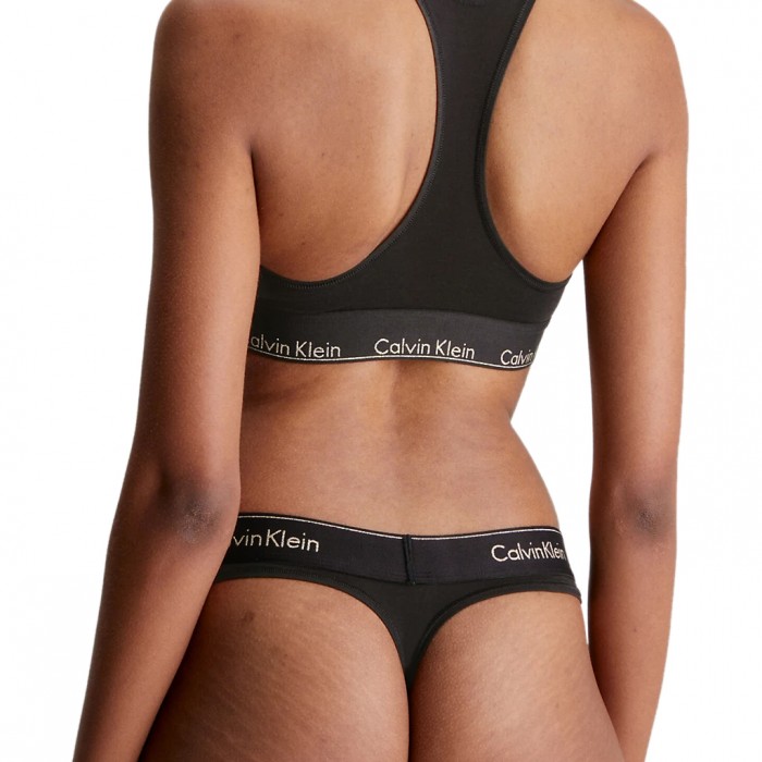 Calvin Klein γυναικείο κυλοτάκι thong με μαύρο λάστιχο και άσπρα γράμματα.53%cotton,35%modal,12%elastane F3786E-6WA